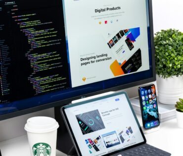 UI UX designer reviewing website wireframes