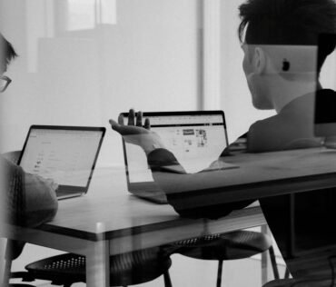 Website development cost planning meeting