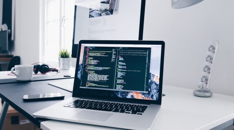 Website development planning on laptop